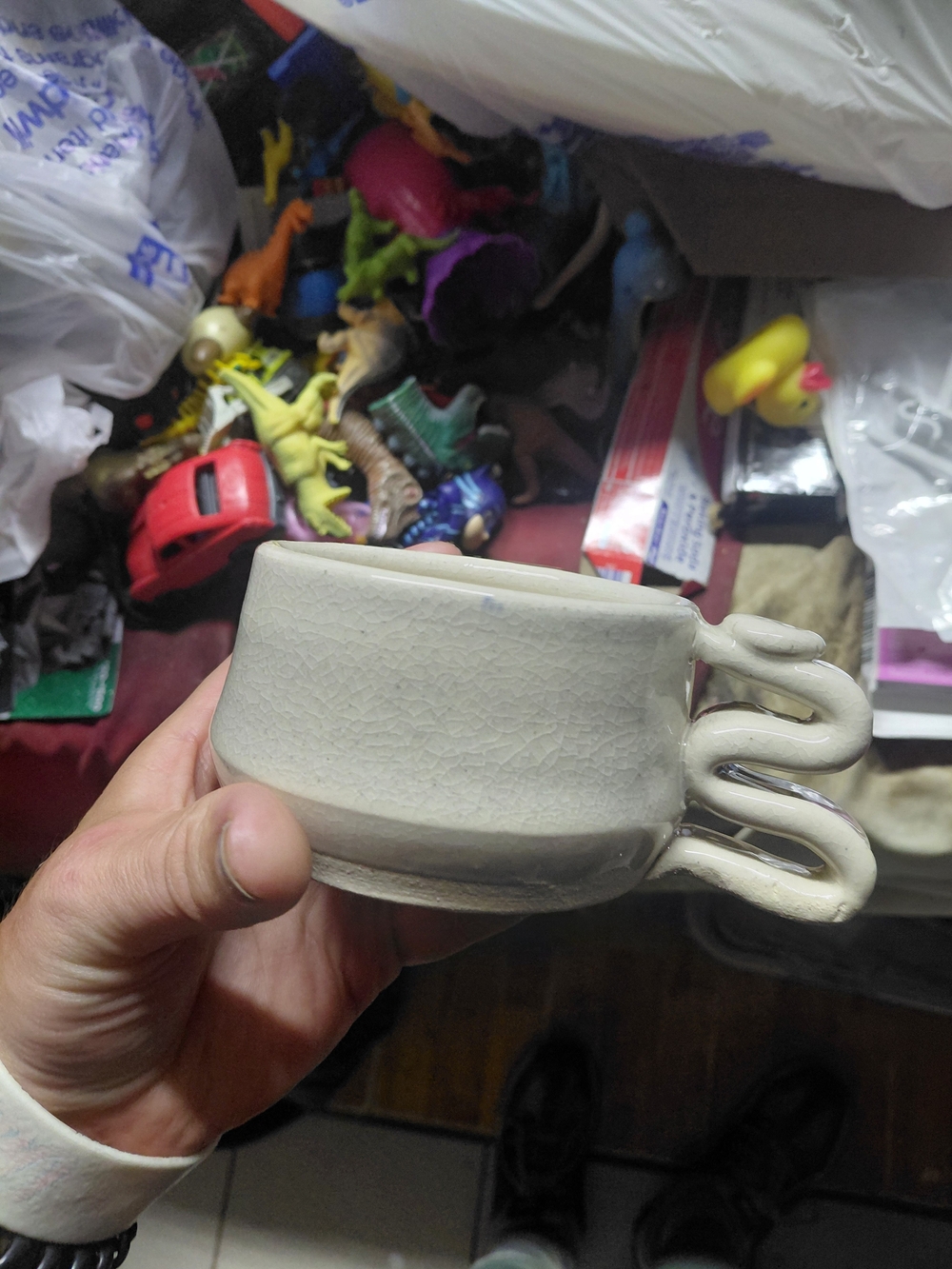 ceramic mug with a distinctive wavy, stacked-loop handle happy emoji handmade